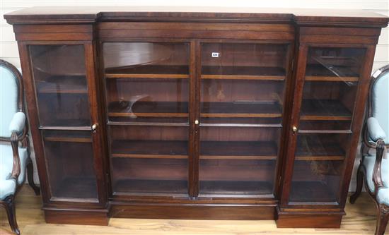 An inverted dwarf breakfront bookcase, W.187cm